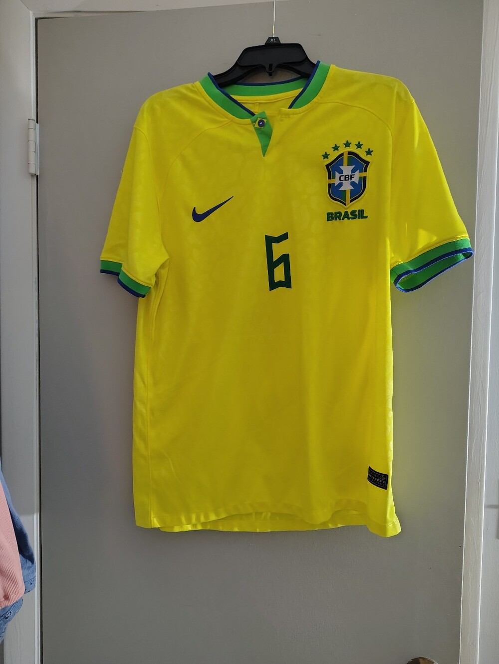 Nike Brazil Men's Yellow Soccer Jersey with Green & Blue Trim #6 World Cup 2022